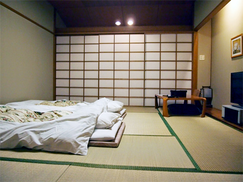 Why do Japanese people sleep on the floor?